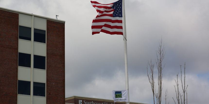 New Enlgand Donor Services Flag flying in front of St. Luke's Hospital