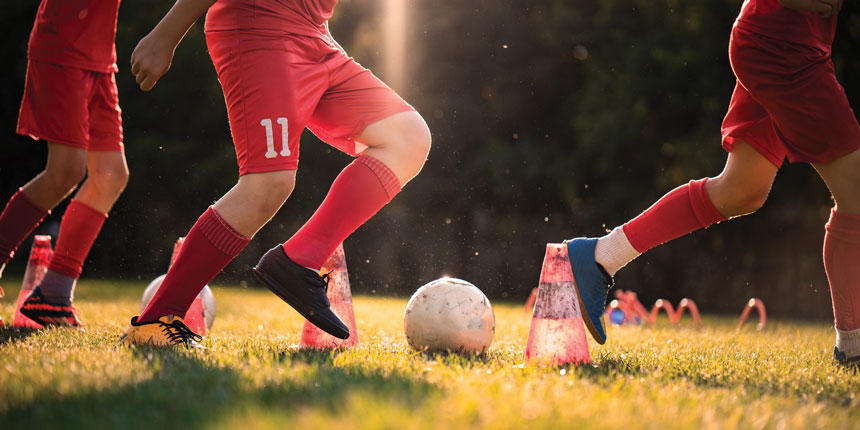 youth soccer players in red