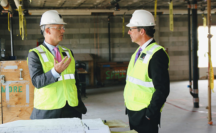 Mayor Jon Mitchell joined Southcoast Health President & CEO Keith Hovan on a tour of the future site of a new, $14 million intensive care unit under construction at St. Luke’s Hospital. The leaders are shown here looking over design plans